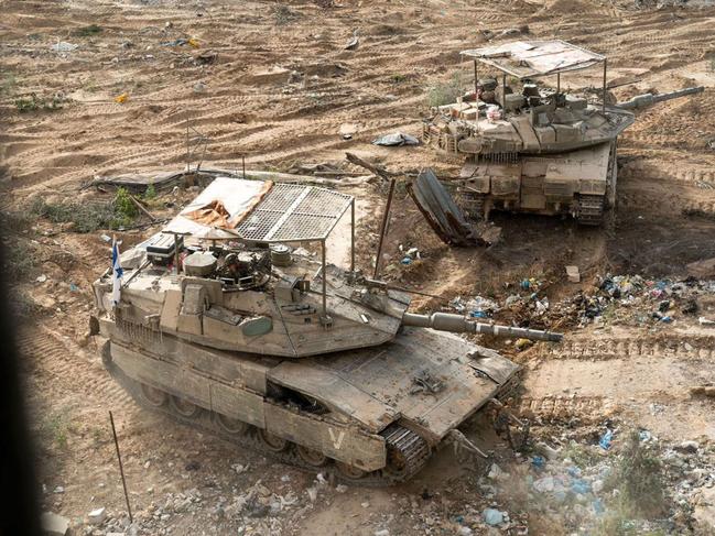 This handout picture released by the Israeli army on June 23, 2024 reportedly shows Israeli army main battle tanks operating in Rafah in the southern the Gaza. Picture: Israeli Army / AFP