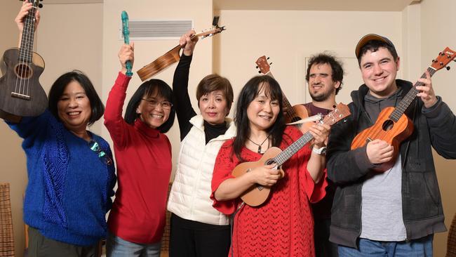 Izumi Nago with music therapy students (L to R) Yasco Pierce, Tachi, Michie Spain, Luke Abdullah and Phillip Pogossov at her studio in Pennant Hills Tuesday July 24, 2018. She runs music classes for kids with disabilities. (AAP IMAGE/Simon Bullard)