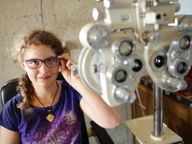 Sariah, 12, gets her eyes tested while staying at Stewart House.