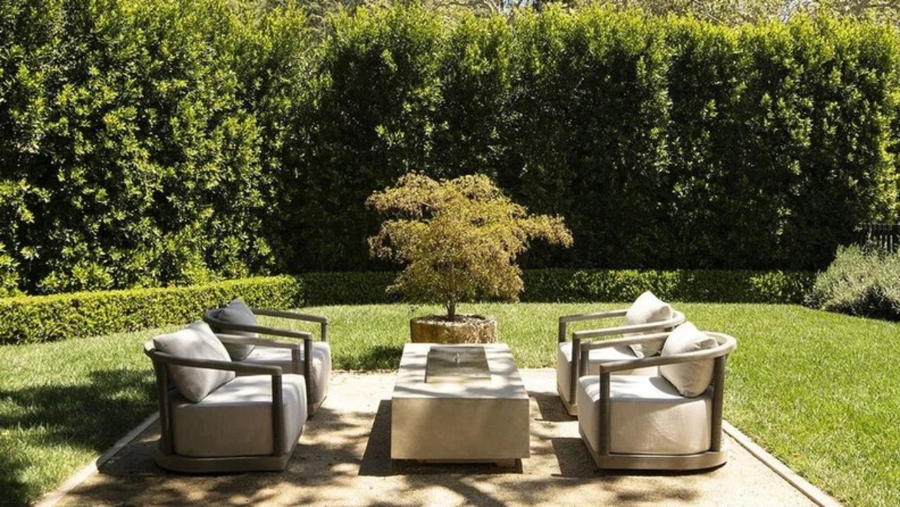 The back yard has multiple places to relax and enjoy your privacy.. Picture: Realtor.com