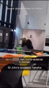 Shock video shows mums wrestling inside school as police probe brawl