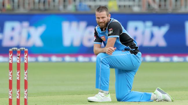 Michael Neser of the Strikers recovers after falling while bowling during the Big Bash League (BBL) match between the Perth Scorchers and the Adelaide Strikers at Optus Stadium in Perth, Wednesday, December 26, 2018. (AAP Image/Richard Wainwright) NO ARCHIVING, EDITORIAL USE ONLY, IMAGES TO BE USED FOR NEWS REPORTING PURPOSES ONLY, NO COMMERCIAL USE WHATSOEVER, NO USE IN BOOKS WITHOUT PRIOR WRITTEN CONSENT FROM AAP