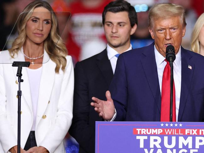 TOPSHOT - Former US President and Republican presidential candidate Donald Trump (C) speaks alongside Co-chair of the Republican National Committee Lara Trump (L), Tiffany Trump's spouse Michael Boulos, daughter of former US President Donald Trump, Tiffany Trump (3rd R), son of former US President Donald Trump Eric Trump (2nd R) and son of former US President Donald Trump Donald Trump Jr. (R) during a campaign rally at PPG Paints Arena in Pittsburgh, Pennsylvania on November 4, 2024. (Photo by CHARLY TRIBALLEAU / AFP)