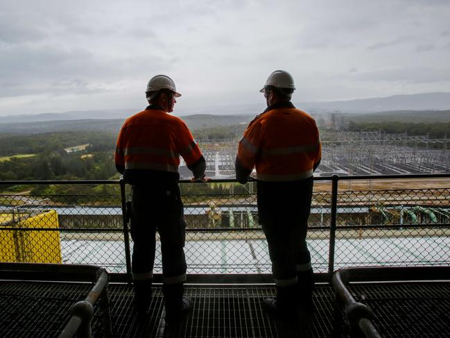 L to R, Antony Cotic, Facilities and Logistics Manager, with Tony Phillips, Group Manager Operations of Earring Power Station in Lake Macquarie, NSW, overlooking the switch yard at the facility today (04/06/2019). Pic Liam Driver