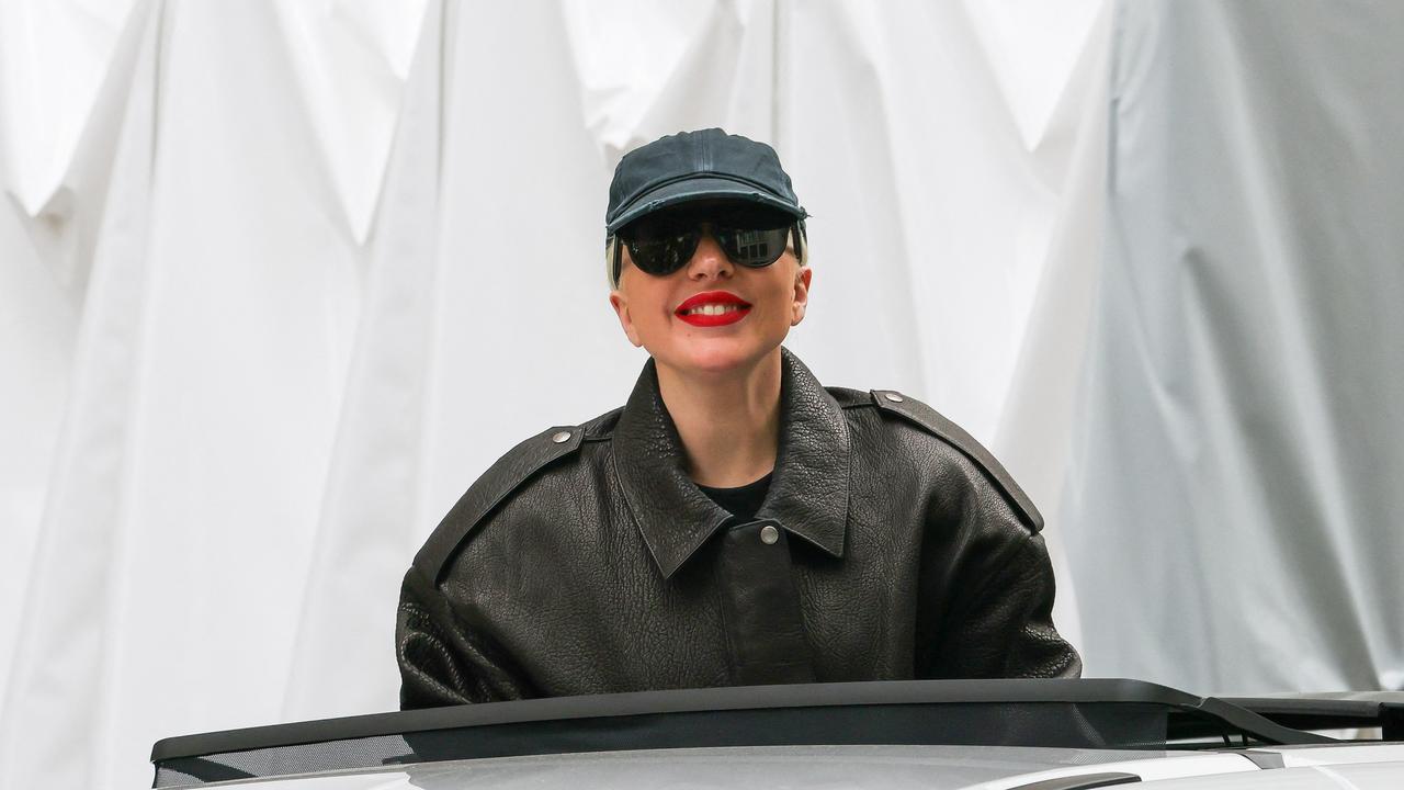 Lady Gaga emerges from a Paris hotel. Picture: Aissaoui Nacer / MEGA