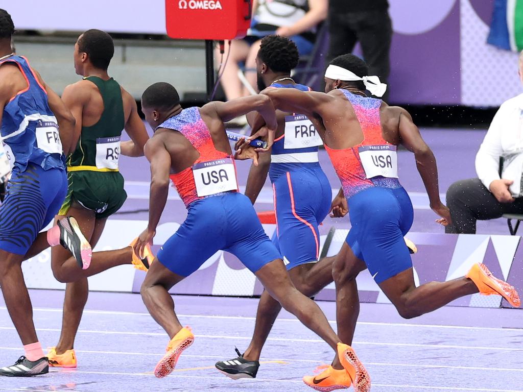 Christian Coleman and Kenneth Bednarek botch the baton exchange. Picture: Patrick Smith/Getty Images