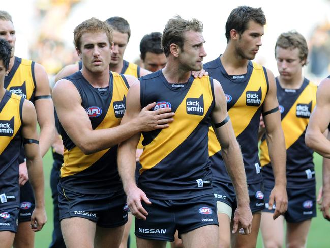 Richmond v Hawthorn. MCG. Daniel Jackson consoles Shane Tuck who got tackled by Sam Mitchell when trying to gave a winning shot for goal.