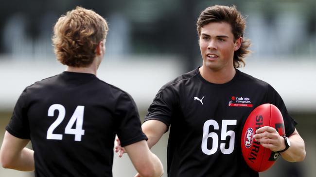 Campbell Chesser, right, could be one of the steals of draft night. Picture: Dylan Burns/AFL Photos