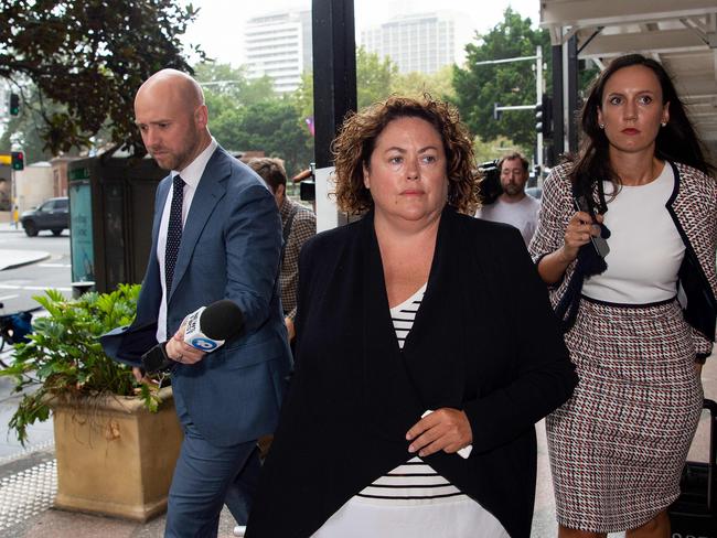 Rosemary Rogers (centre) has been jailed for her part in a kickback scheme to defraud the National Australia Bank. Picture: NCA NewsWire/Bianca De Marchi