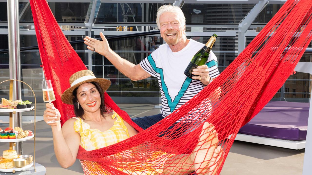 Sir Richard Branson, chairman of the Virgin Group with schoolteacher Nicole Katrib on board a Virgin Voyages ship Resilient Lady. Photographer: Scott Elher