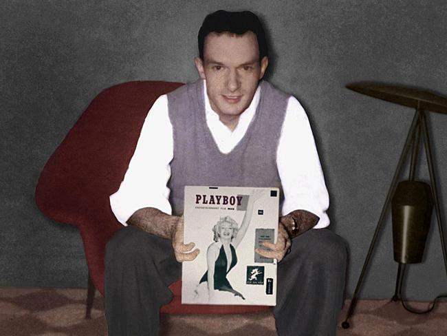 Hefner holding the launch issue in December 1953. Pic: AFP PHOTO/HO