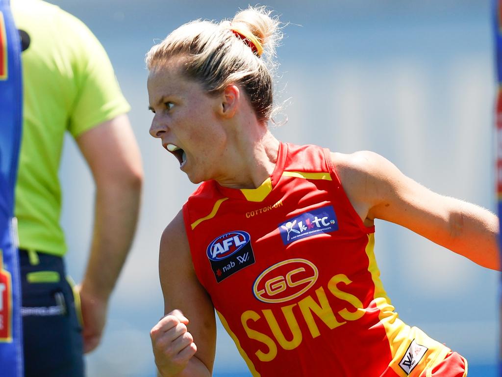 MELBOURNE, AUSTRALIA - JANUARY 16: Kate Surman of the Suns celebrates a goal during the 2022 AFLW Round 02 match between the West Coast Eagles and the Gold Coast Suns at VU Whitten Oval on January 16, 2022 in Melbourne, Australia. (Photo by Michael Willson/AFL Photos via Getty Images)
