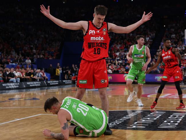 PERTH, AUSTRALIA - SEPTEMBER 20: Ben Henshall of the Wildcats stands over Nathan Sobey of the Phoenix during the round one NBL match between Perth Wildcats and South East Melbourne Phoenix at RAC Arena, on September 20, 2024, in Perth, Australia. (Photo by Will Russell/Getty Images)