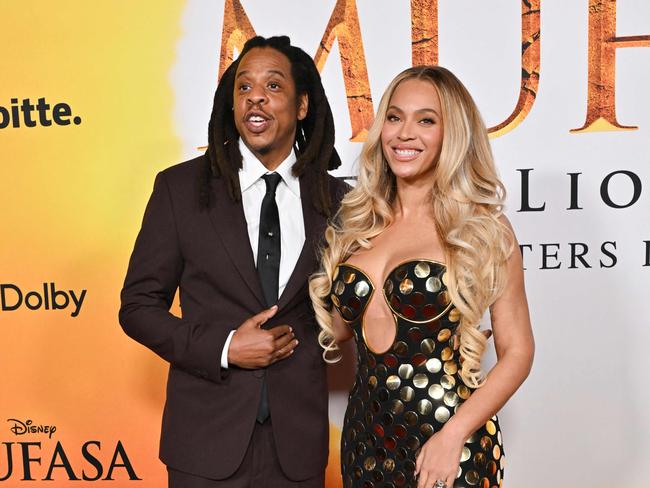 US rapper Jay-Z and US singer-songwriter Beyonce attend the world premiere of Disney's 