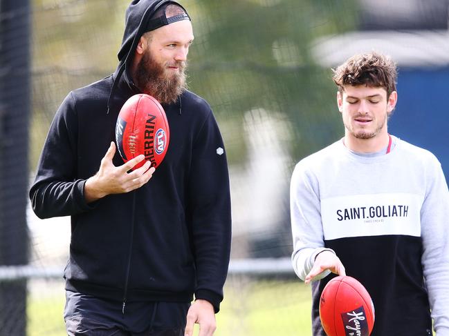 MELBOURNE, AUSTRALIA - AUGUST 28:  Max Gawn of the Demons (L) and Angus Brayshaw walks laps during an optional  Melbourne Demons AFL training session at Gosch's Paddock on August 28, 2018 in Melbourne, Australia.  (Photo by Michael Dodge/Getty Images)