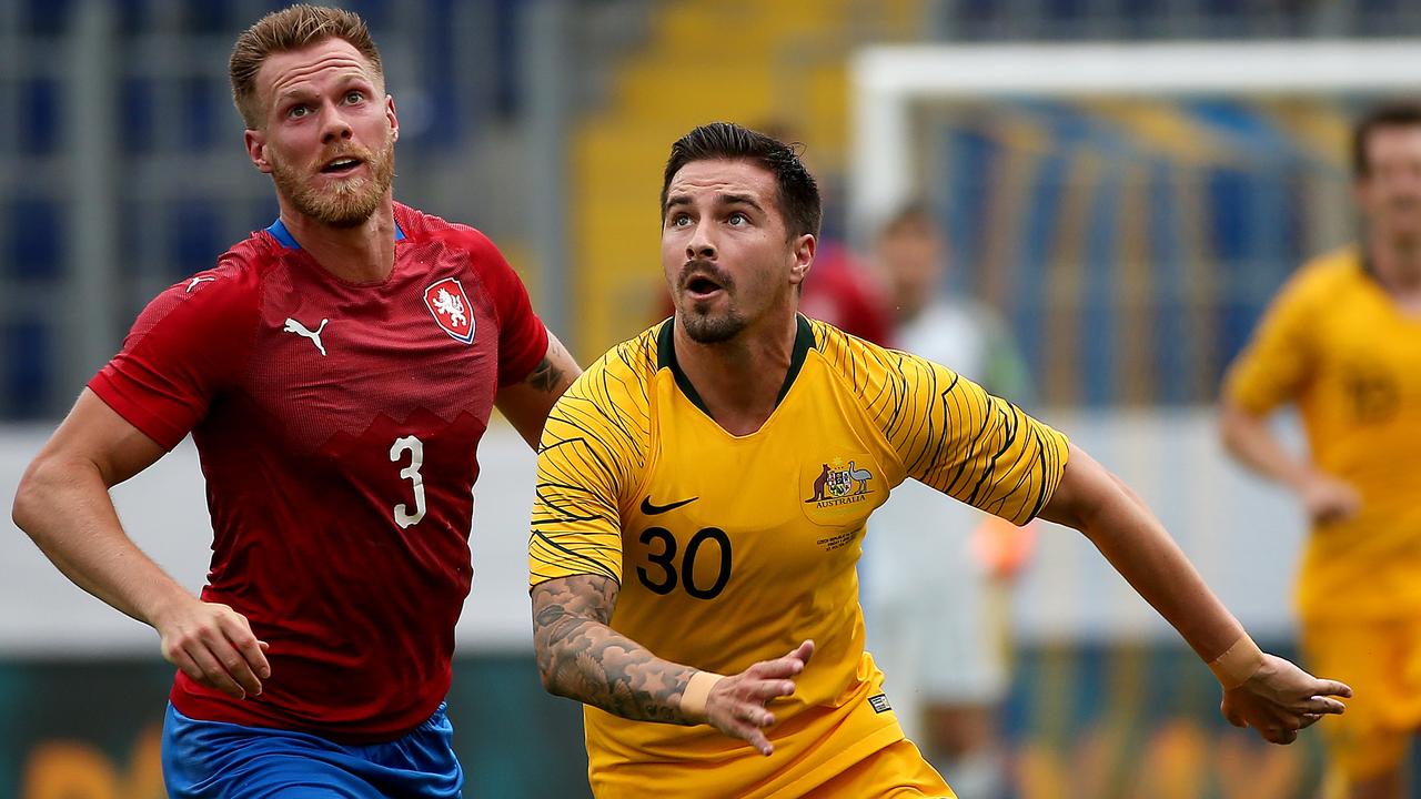 Jamie Maclaren with eyes on the ball.