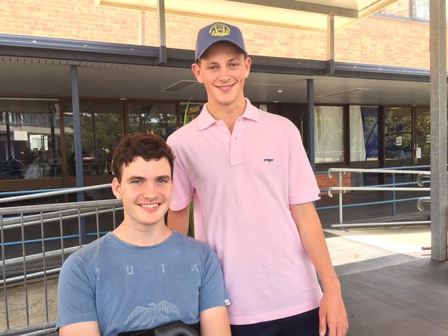 Neck injury victim Conor Tweedy (left) with Ollie Bierhoff. Picture: Kristine Taylor, ABC