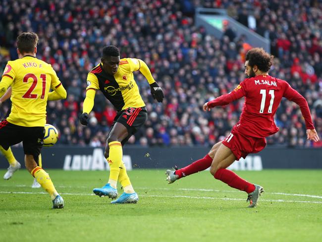 LIVERPOOL, ENGLAND - DECEMBER 14: Mohamed Salah of Liverpool scores his teams first goal during the Premier League match between Liverpool FC and Watford FC at Anfield on December 14, 2019 in Liverpool, United Kingdom. (Photo by Clive Brunskill/Getty Images)