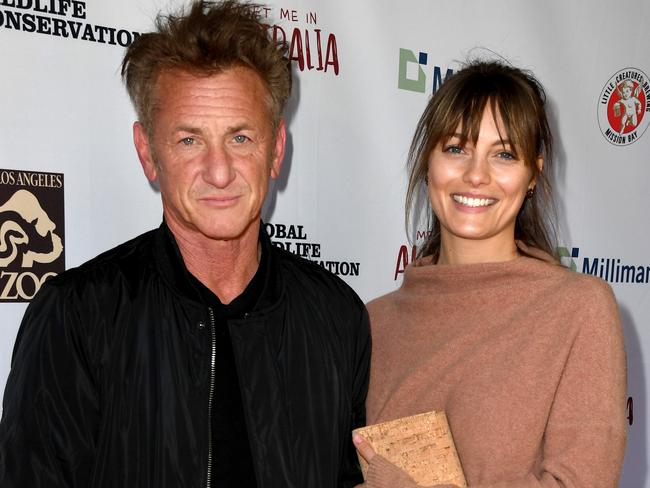 LOS ANGELES, CALIFORNIA - MARCH 08: Sean Penn (L) and Leila George arrive at the "Meet Me In Australia" event benefiting Australia Wildfire Relief Efforts at Los Angeles Zoo on March 08, 2020 in Los Angeles, California. (Photo by Kevin Winter/Getty Images)