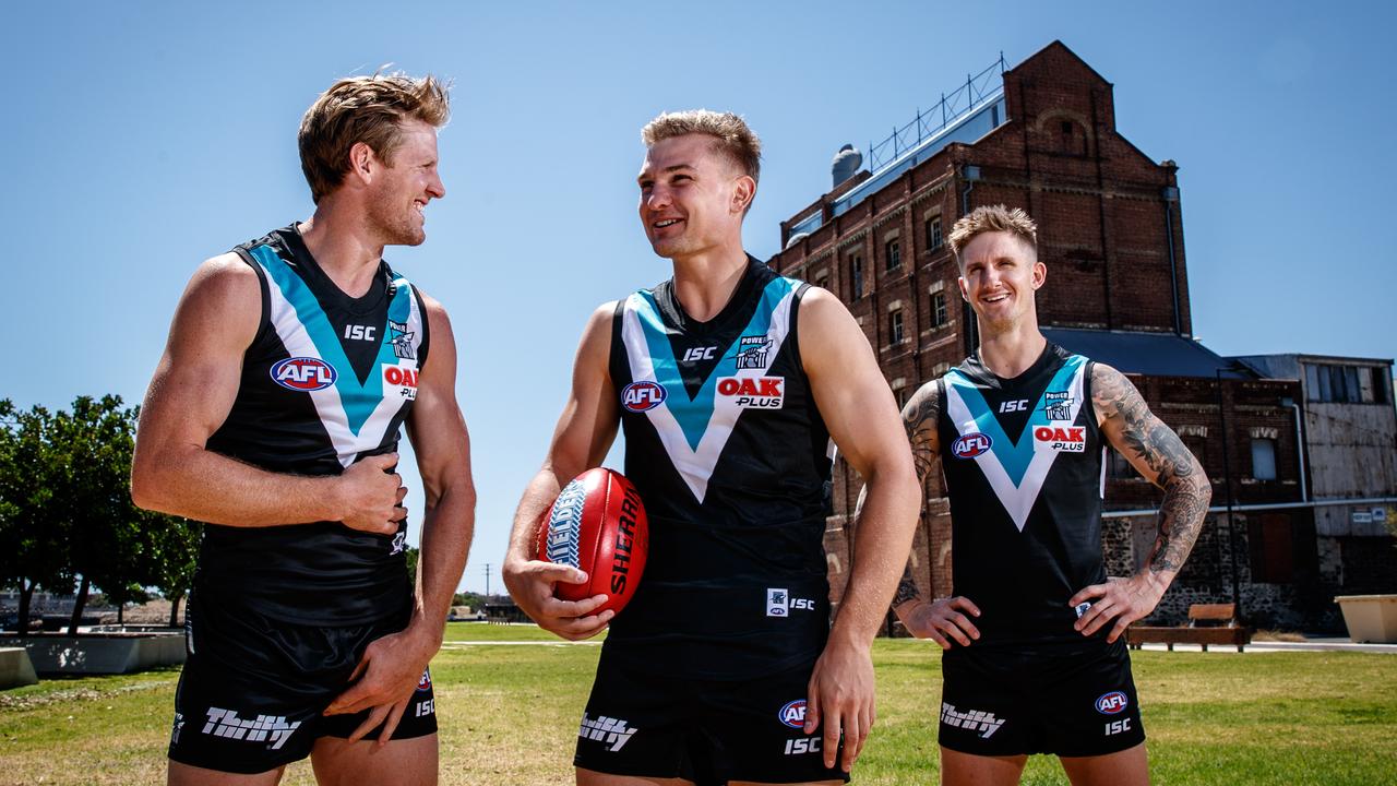 Port Adelaide's 2019 leadership group, from right, co-captains Tom Jonas and Ollie Wines with deputy Hamish Hartlett at Harts Mill, Port Adelaide. Picture MATT TURNER.