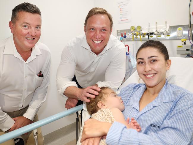 Premier Steven Miles with Robert Skelton at the Nambour Hospital with Mereana Harrod and son Jai 20mnths old from Bli Bli .Pic Annette Dew office of the Premier