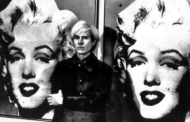 The pop artist in front of his double portrait of Marilyn Monroe at London's Tate Gallery in 1971. Picture: AP