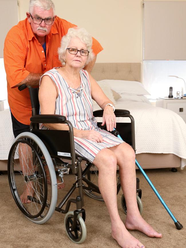 Mr O'Brien said he had to spend 14 hours in the waiting room while looking for treatment. Photo of him with wife Robin O'Brien at home.