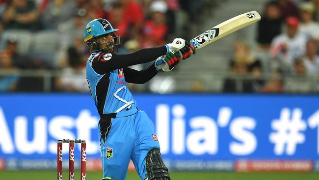 Rashid Khan hits out during his quickfire 21 not out from seven balls against the Melbourne Renegades. Picture: JULIAN SMITH (AAP)