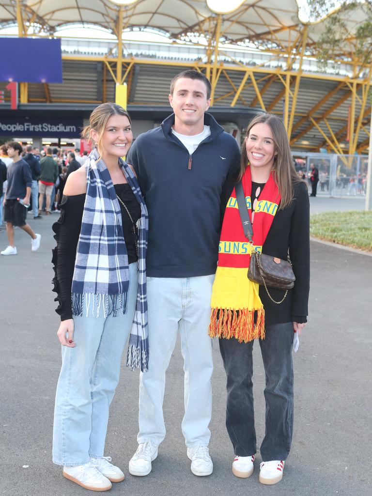 Gold Coast Suns vs. Collingwood. Innes Beech, Kai Van Kool and Charlotte Hughes. 29 June 2024 Carrara Picture by Richard Gosling