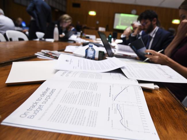 Journalists are seen inside the 2018 Budget Lockup at Parliament House in Canberra, Tuesday, May 8, 2018. Mr Morrison today handed down his third budget (AAP Image/Lukas Coch) NO ARCHIVING