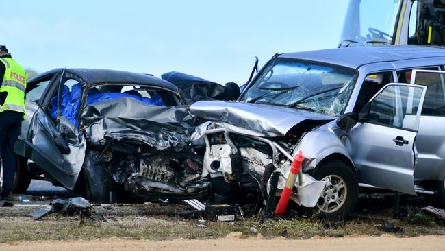 Emergency services attend a 3 person fatal crash involving four vehicles south of Townsville. Picture: Alix Sweeney