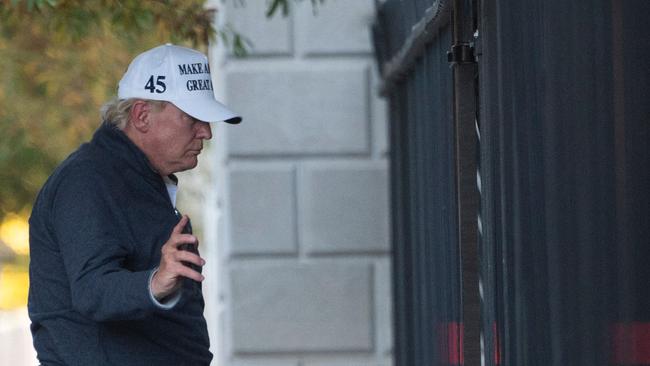 President Donald Trump returns to the White House from playing golf in Washington, DC on November 7. Picture: AFP