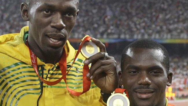 Usain Bolt, left, and Nesta Carter.