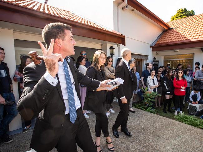 Pictures from the auction of 1A Johnson Street Chatswood on 24th April 2021 as auctioneer Chris Scerri brings the gavel down on the property sale.(Pictures by Julian Andrews). **FOR A DAILY TELEGRAPH STORY, SPEAK TO AIDAN DEVINE BEFORE USE*