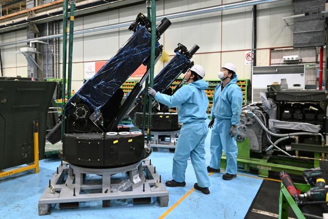 South Korean engineers work on a 120mm self-propelled mortar at the Hanwha Aerospace factory in Changwon