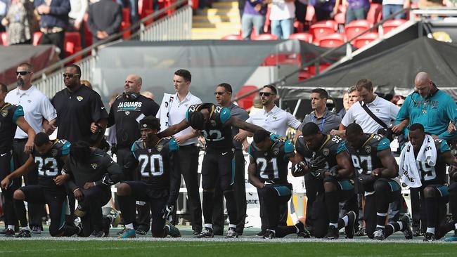 Jacksonville Jaguar players show their protest during the National Anthem during the NFL International Series match between Baltimore Ravens and Jacksonville Jaguars at Wembley Stadium. Picture: Getty