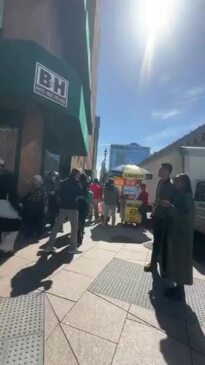 Line for Eclipse Glasses Wraps Around NYC Block