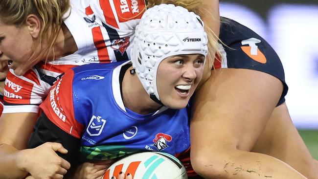 NEWCASTLE, AUSTRALIA - JULY 25: Hannah Southwell of the Knights is tackled during the round one NRLW match between Newcastle Knights and Sydney Roosters at McDonald Jones Stadium on July 25, 2024 in Newcastle, Australia. (Photo by Scott Gardiner/Getty Images)