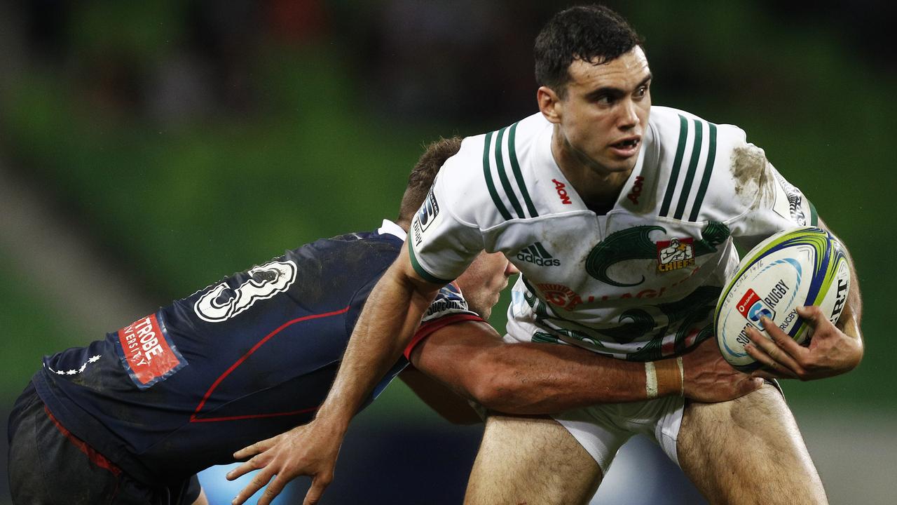 Jack Debreczeni of the Chiefs is tackled at AAMI Park in Melbourne.