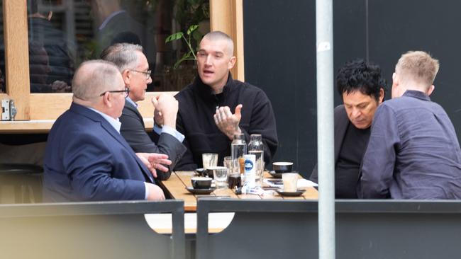 Foxtel boss Patrick Delany, Fox Sports managing director Steve Crawley, Dustin Martin, Fox Footy commentator Jack Riewoldt and Martin's manager Ralph Carr.