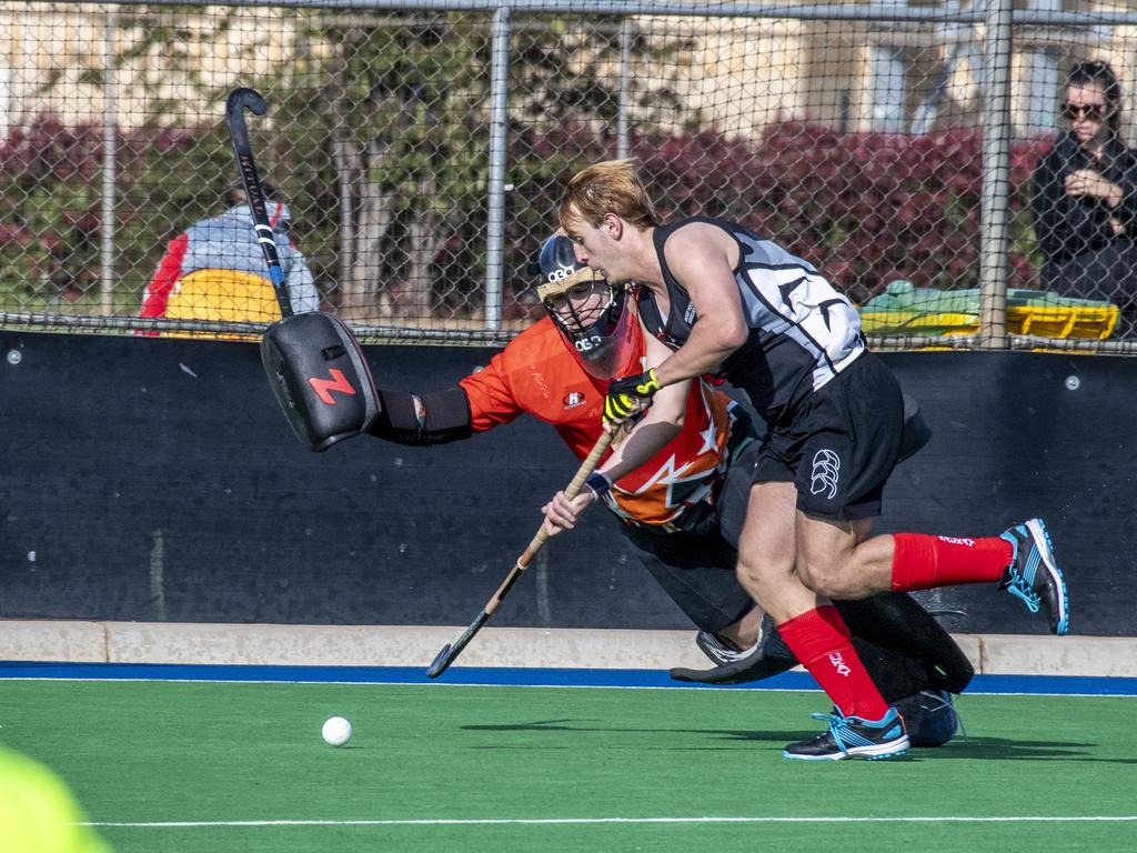 Cade Banditt, Ipswich and Ryan Wagner, Mackay. Ipswich vs Mackay. Hockey Queensland Championship. Saturday, May 1, 2021. Picture: Nev Madsen.