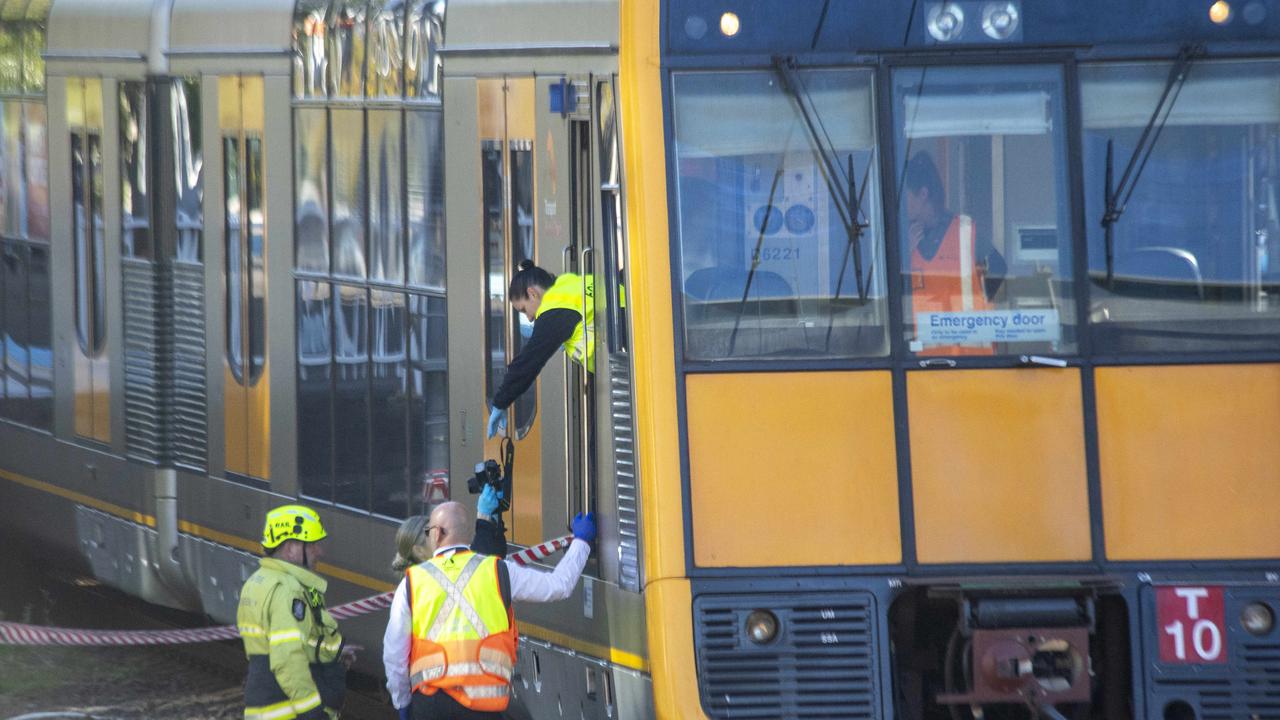 Emergency services attend the scene where a father and his daughter died after an incident at the Carlton train station in Sydney. Picture: NewsWire / Jeremy Piper