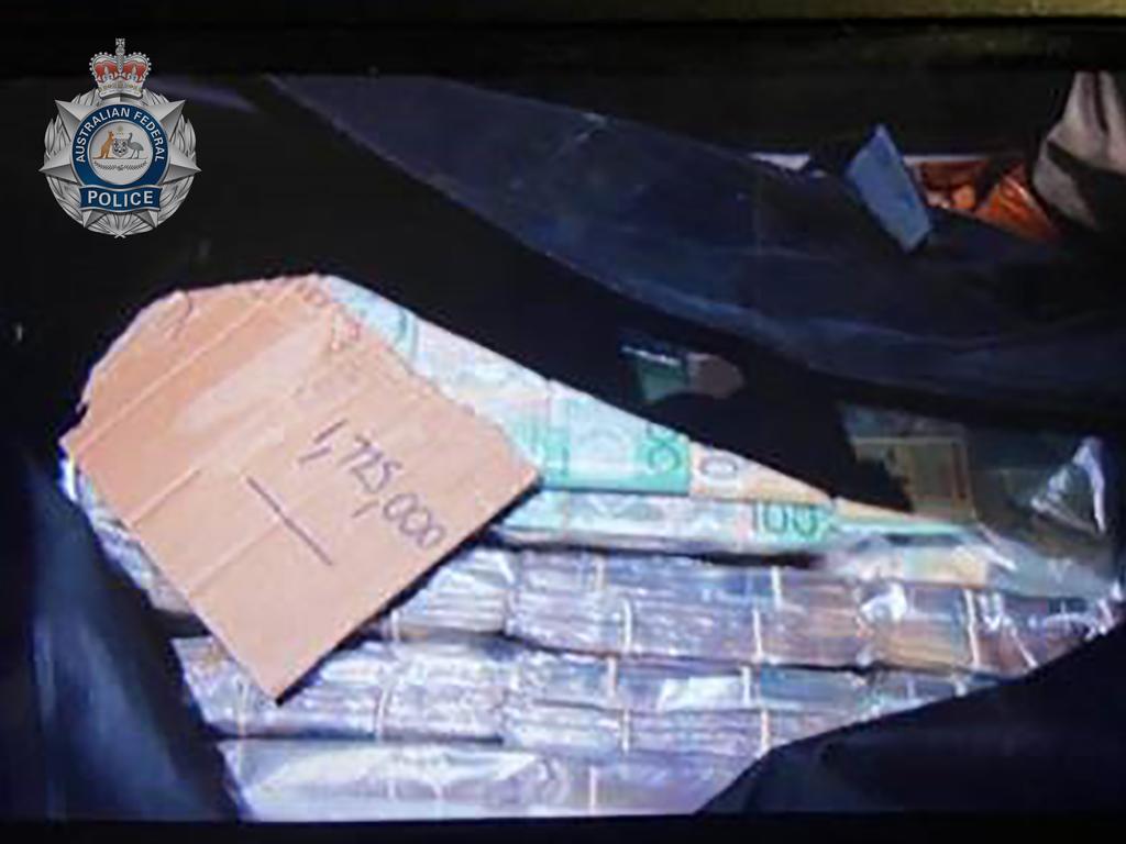 OP Merredin The AFP has dismantled an Australian criminal network allegedly importing and manufacturing hundreds of kilograms of cocaine under the direction of a Colombian organised crime syndicate. Cash seized in West End