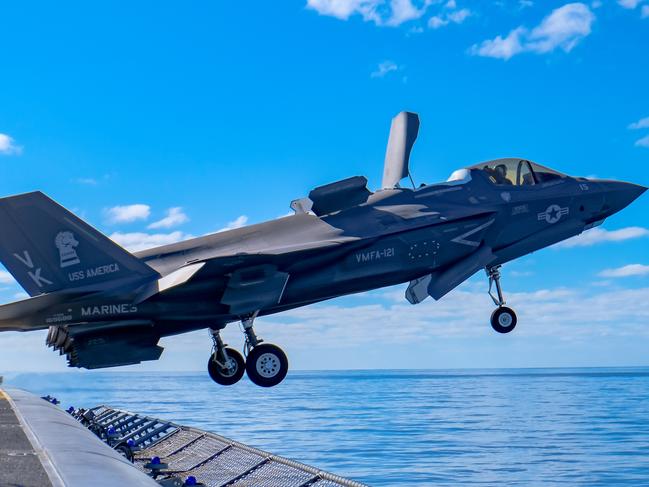 A U.S. Marine Corps F-35B Lightning II with Marine Fighter Attack Squadron 121 attached to Marine Medium Tiltrotor Squadron 265 (Reinforced), 31st Marine Expeditionary Unit (MEU), departs the flight deck of amphibious assault ship USS America (LHA 6), during Talisman Sabre on July 19, 2021. The F-35B Lightning IIÃ¢â¬â¢s fifth generation strike fighter capabilities bring more lethality and flexibility to combat commanders than any other aircraft platform. Australian and U.S. forces combine biannually for Talisman Sabre, a month-long multi-domain exercise that strengthens allied and partner capabilities to respond to the full range of Indo-Pacific security concerns. The 31st MEU is operating aboard ships of America Expeditionary Strike Group in the 7th fleet area of operations to enhance interoperability with allies and partners and serve as a ready response force to defend peace and stability in the Indo-Pacific region. (U.S. Marine Corps photo by Staff Sgt. John Tetrault)