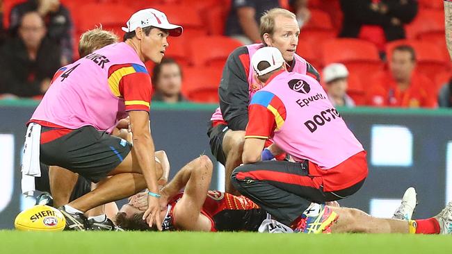 Michael Barlow was in severe pain on the ground after breaking his leg. Picture: Getty