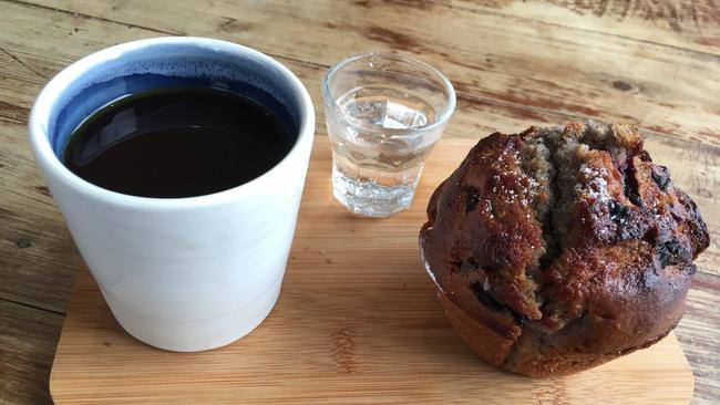 Black coffee with soda water and mixed berries muffin at Pablo & Rusty’s.