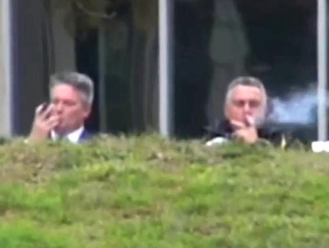 No cigar this time ... this image of Finance Minister Matthias Cormann and Treasurer Joe Hockey puffing on cigars before last year’s budget announcement did not play well for the government. Picture: CHANNEL 9