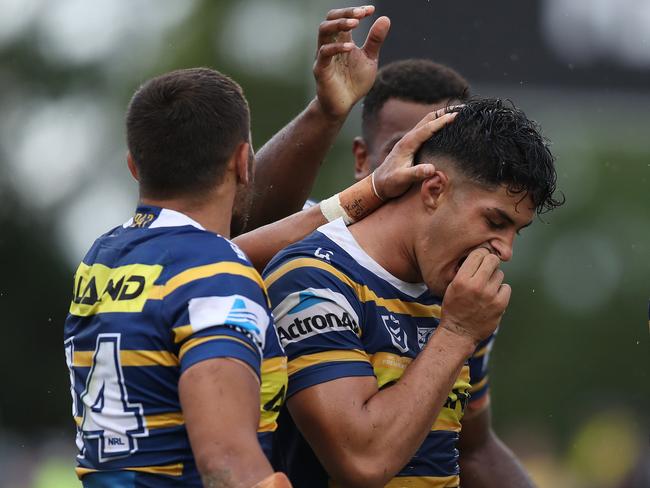 Parramatta's Dylan Brown is congratulated after a try by Michael Jennings. Picture: Brett Costello