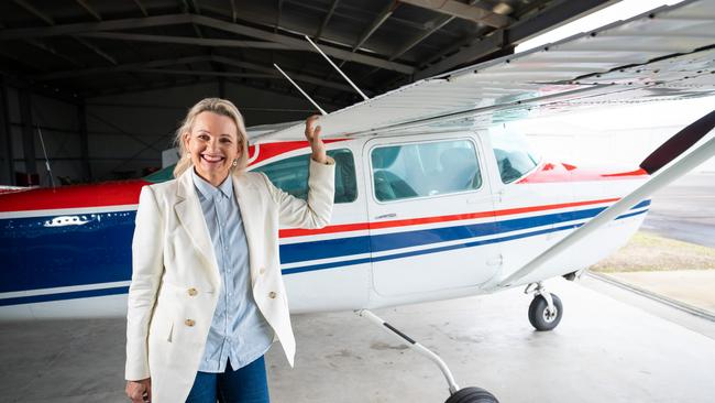 Sussan Ley at the Albury Airport with a plane she used to train in.