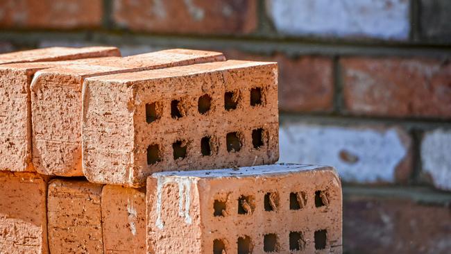 A teenager, aged about 14, is alleged to have thrown the brick before fleeing into Bagot Community with two other youths.